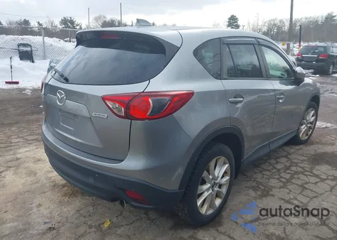 2013 Mazda Cx-5 Grand Touring z USA, uszkodzony, nr VIN JM3KE4DE7D0105302